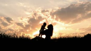 (Taken from http://ak6.picdn.net/shutterstock/videos/2292056/preview/stock-footage-silhouettes-mother-and-baby-sunset.jpg)
